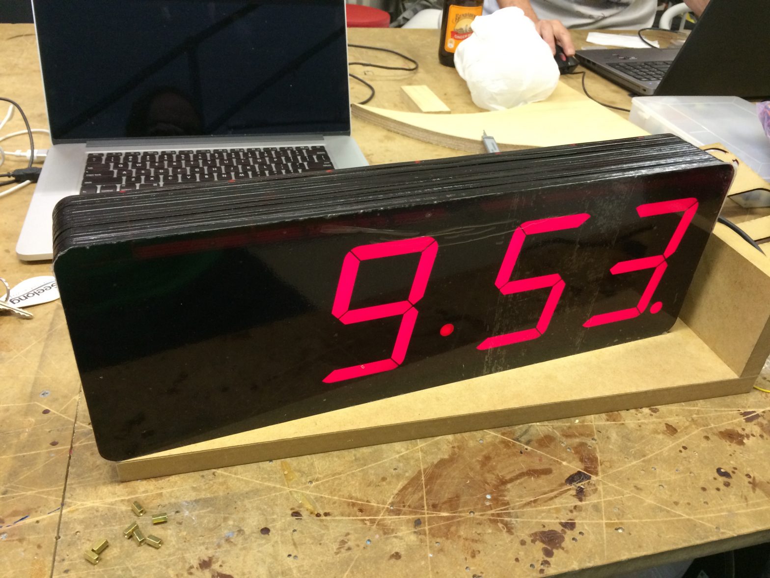 large 7 segment display clock showing 9:53 time