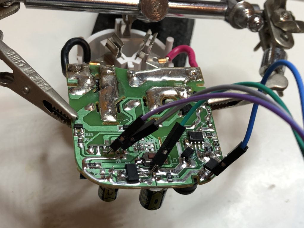 wires soldered to circuitboard to enable flashing